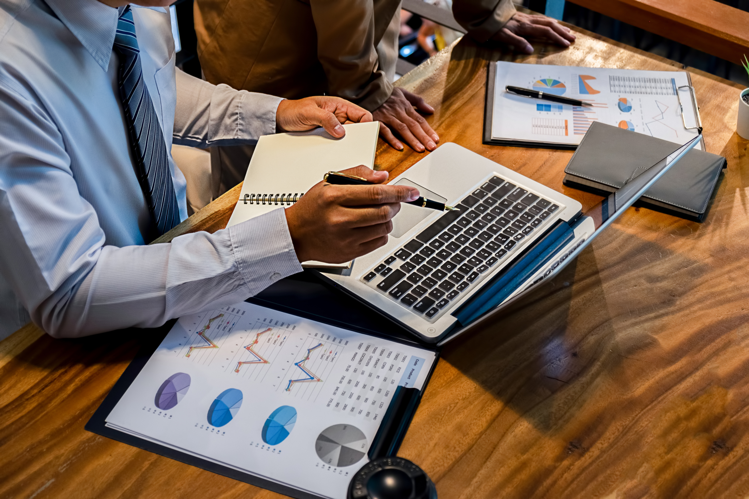 Administrator business man financial inspector Administrator business man financial inspector and secretary making report calculating balance. Internal Revenue Service checking document. Audit concept and secretary making report calculating balance. Internal Revenue Service checking document. Audit concept